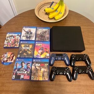 PlayStation 4 Slim with 4 controllers and games